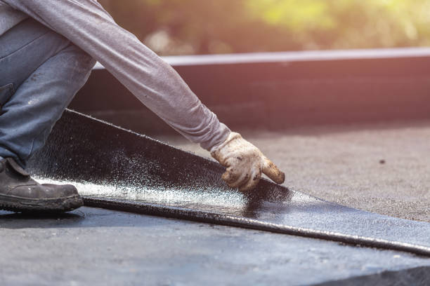 Professional Basement Waterproofing technician working in Pinckney, MI